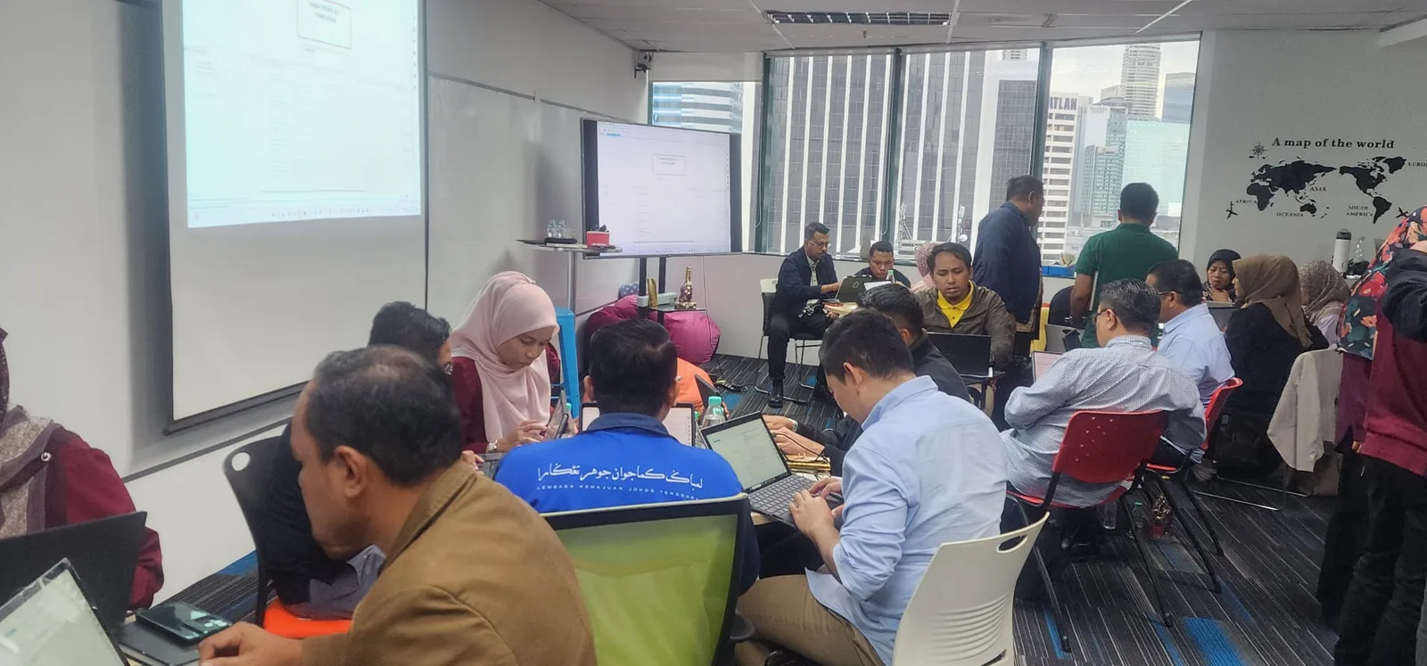 Participants working on their laptops