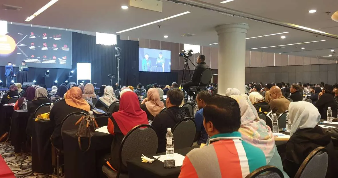 Seminar audience in a hotel ballroom