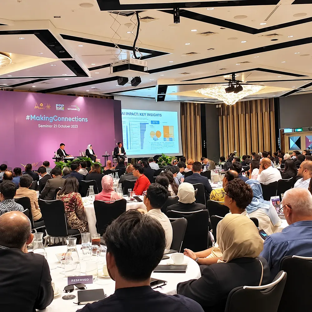 Conference audience in a hotel ballroom