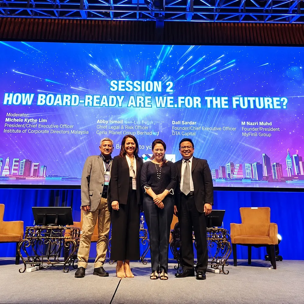 Speakers on stage at an ICDM session